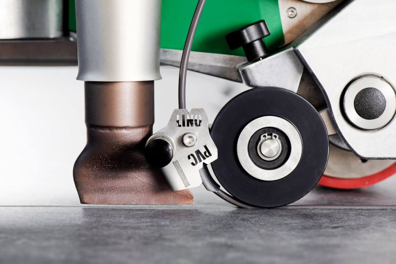 Leister UNIFLOOR 500 120v Automatic Safety/Vinyl Floor Welder 169.616 nozzle & roller closeup